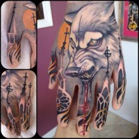 Mysterious detailed bloody demonic wolf tattoo on hand combined with flames and cathedrals