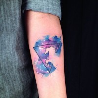 Mysterious multicolored triangle shaped space tattoo on forearm combined with unicorn silhouette