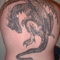 Mystic dragon tattoo on back for men