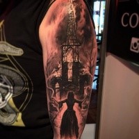Mystical black and gray style shoulder tattoo of burning church and witch