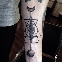 Mystical black ink forearm tattoo of big tree with moons and geometrical figures