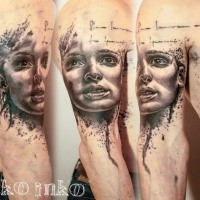 Mystical black ink shoulder tattoo of scary woman face
