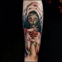 Mystical colored forearm tattoo of woman in gas mask