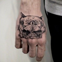 Mystical dot style hand tattoo of creepy cat with tree eyes