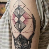 Mystical geometrical tattoo with skull tattoo on shoulder