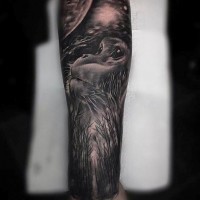 Mystical painted very detailed monkey tattoo on forearm