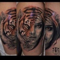 Mystical realistic looking colored leg tattoo of half tiger half woman portrait