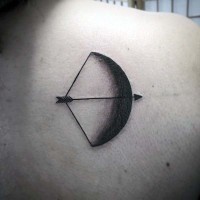 Mystical simple black ink moon shaped bow tattoo on shoulder