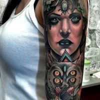 Natural colored mystical woman portrait tattoo on sleeve combined with mystical bat