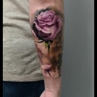 Natural looking beautiful looking arm tattoo of pink rose