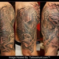 Tatuaje en el brazo,
la muerte con humano en el cementerio