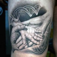 Natural looking black and white family hands with DNA tattoo on thigh