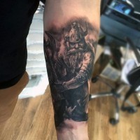 Natural looking black and white medieval fantasy warrior tattoo on forearm