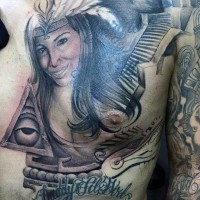 Natural looking black and white tribal woman portrait tattoo on chest with temple