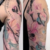 Natural looking colored beautiful underwater flowers with squid and lettering tattoo
