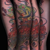Natural looking colored leg tattoo of little frog and unusual plant