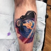 Natural looking colored leg tattoo of Earth planet in space with moon