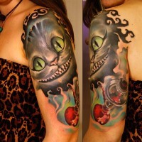 Natural looking colored smiling fantasy cat tattoo on shoulder