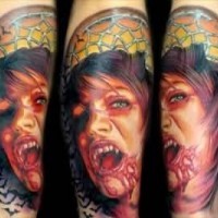 Natural looking little colored woman zombie portrait tattoo on arm