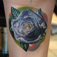 Natural looking real photo like blue colored rose tattoo on arm