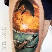 Natural looking realism style thigh tattoo of dolphin with turtles