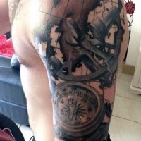 Nautical themed colored compass with map tattoo on shoulder