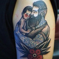 Nautical themed colored father and son tattoo on shoulder