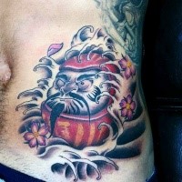 Neo japanese style colored belly tattoo of daruma doll with small waves and flowers