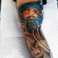 Neo japanese style colored biceps tattoo of daruma doll with demonic mask