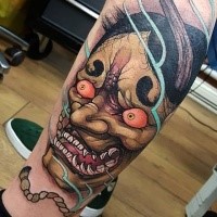 Neo japanese style colored leg tattoo of demonic face