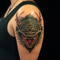 Neo japanese style colored shoulder tattoo of monster mask with horns