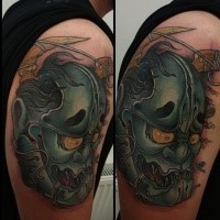 Neo japanese style colored shoulder tattoo of demons mask