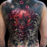 Neo japanese style colored whole back tattoo of devils face with flowers