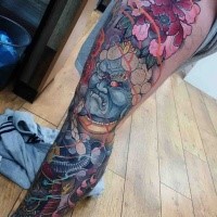 Neo japanese style colored whole leg tattoo of demon with various flowers