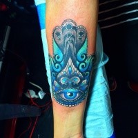 Neo traditional colored forearm tattoo of Hamsa symbol with eye and ornaments