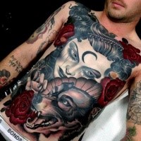 Neo traditional colored mystical woman with wolf tattoo on chest and belly combined with red roses