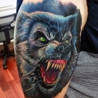Neo traditional colored shoulder tattoo of very detailed werewolf face