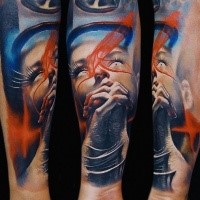 Neo traditional style colored arm tattoo of praying woman