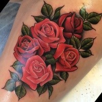 Neo traditional style colored beautiful looking rose flowers tattoo on leg