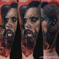 Neo traditional style colored forearm tattoo of devils woman with flames