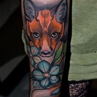Neo traditional style colored fox tattoo on forearm with small flower