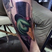 Neo traditional style colored gentleman like dick tattoo on leg