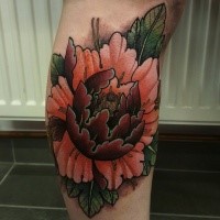 Neo traditional style colored leg tattoo of large flower