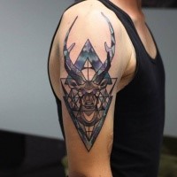 Neo traditional style colored shoulder tattoo of deer skull and triangles