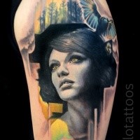 Neo traditional style colored shoulder tattoo of woman face with big bird
