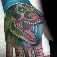 New school colored hand tattoo of bloody dinosaur head