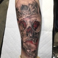 New school illustrative style forearm tattoo of human skulls