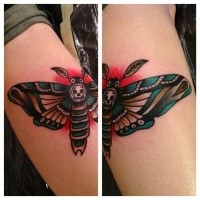 New school style arm tattoo of mystical butterfly with skull