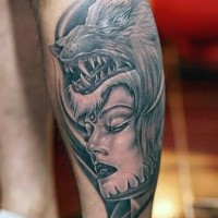 New school style black and white leg tattoo of woman with wolf helmet