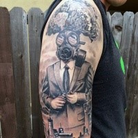 New school style black ink man i suit and gas mask tattoo on sleeve combined with city sights